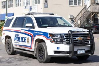 Woman Arrested After Truck Gets Stuck on Concrete Barrier in Downtown London Parking Lot
